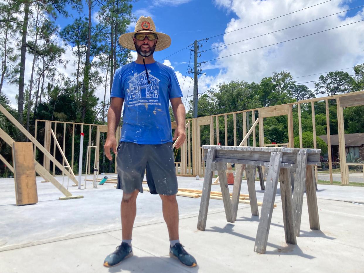 Kristopher Barajas, an Iraq War veteran and Purple Heart recipient, stands at the site of his future home with Habitat for Humanity of St. Augustine and St. Johns County.