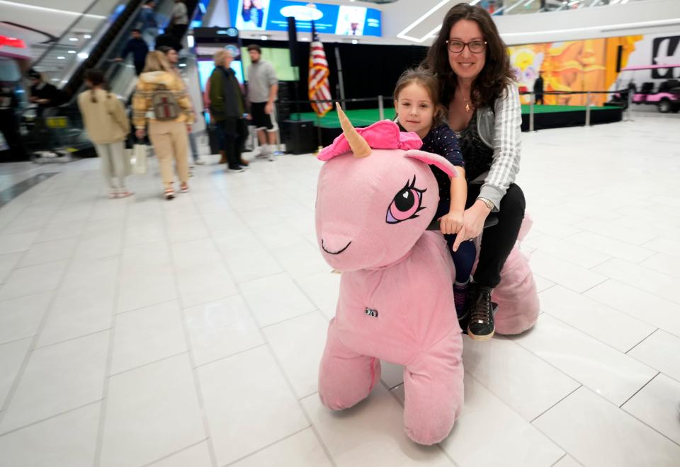 Visitors taking a Dream Rider for a spin at American Dream on Nov. 9, 2023.