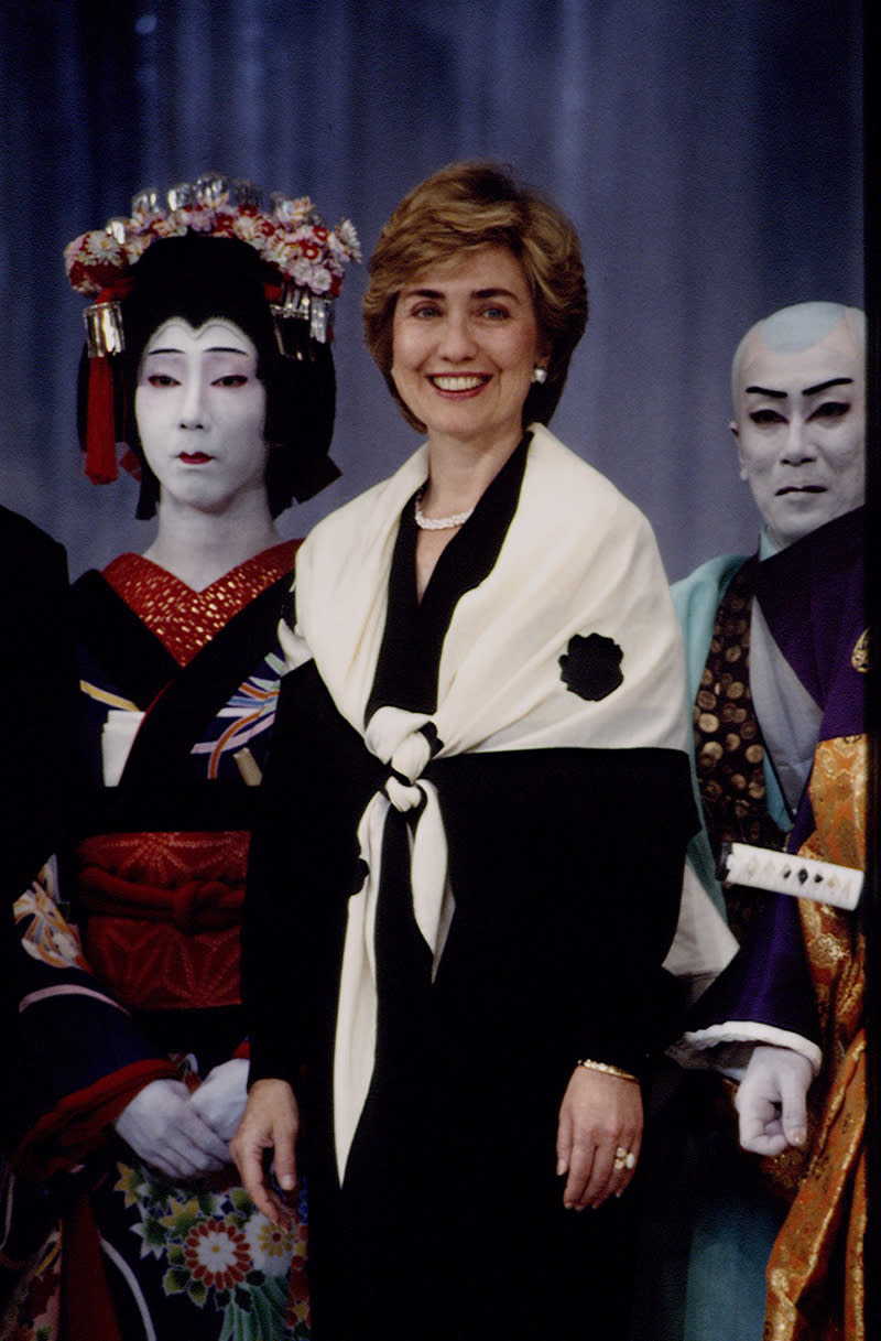 Hillary Clinton wearing a white scarf with a black jacket on July 11, 1993
