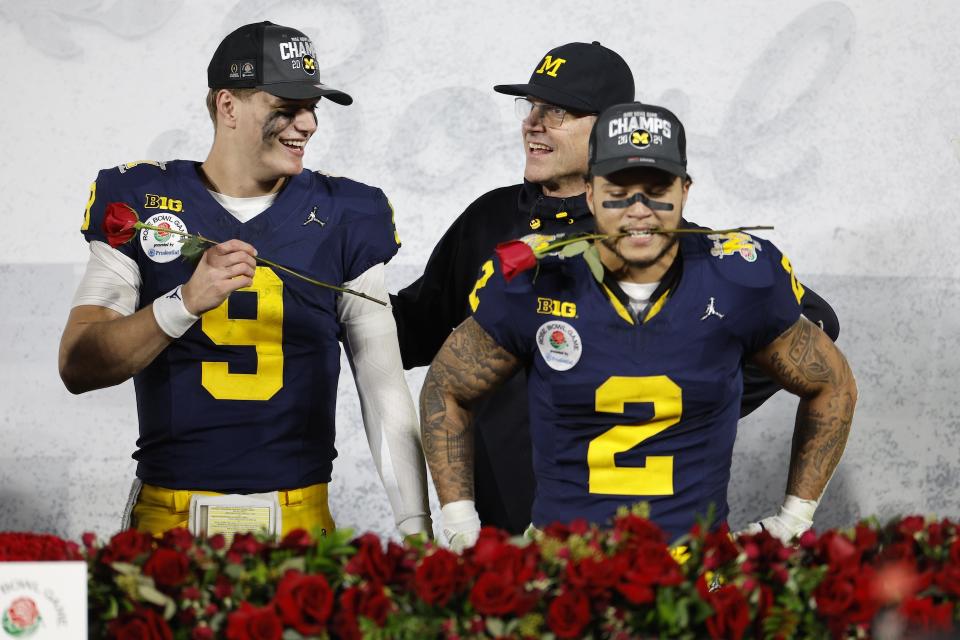 QB J.J. McCarthy, RB Blake Corum and head coach Jim Harbaugh after winning the Rose Bowl. (Kevork Djansezian/Getty Images)