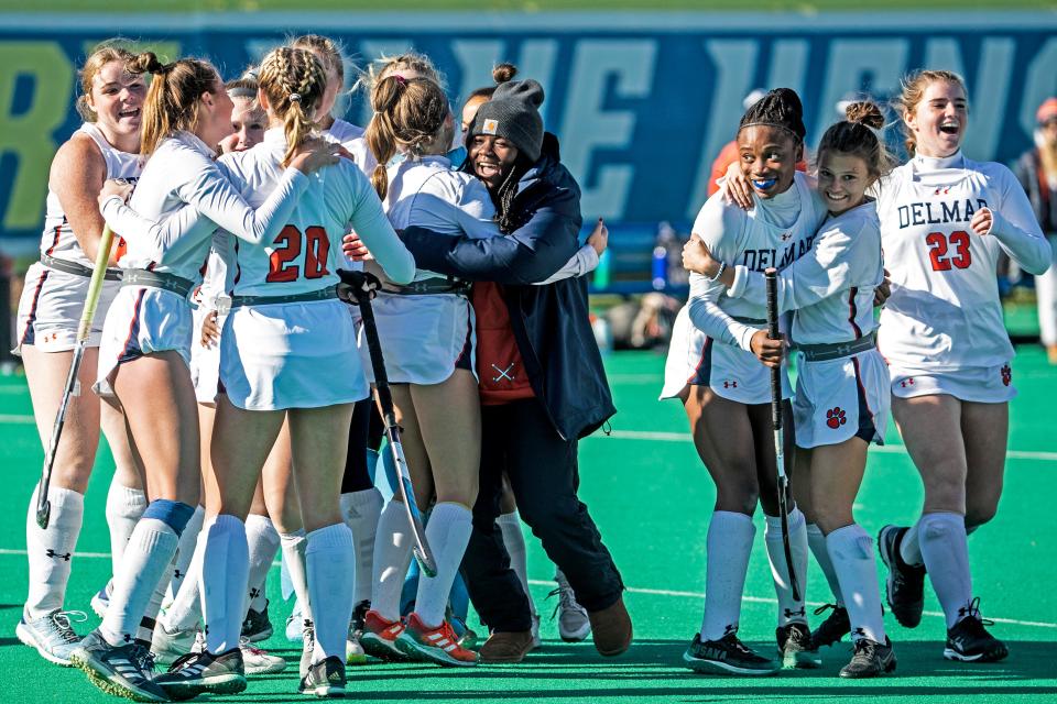 Delmar celebrates its 7-1 victory over Archmere for the Wildcats' sixth straight DIAA Division II field hockey championship, and seventh consecutive title overall, on Saturday at Rullo Stadium.