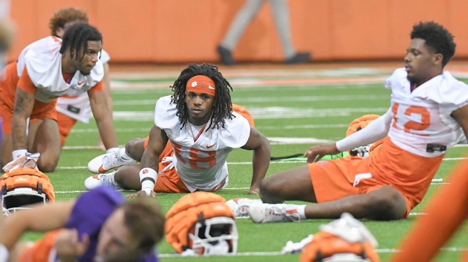 Clemson wide receiver T.J. Moore (1), left, Misun Kelley (18), and Bryant Wesco Jr. (12) during the Clemson first football August practice in Clemson, S.C. Thursday August 1, 2024.