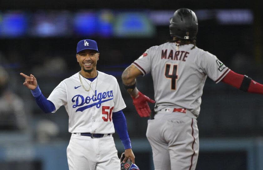 Dodgers second baseman Mookie Betts Arizona Diamondbacks second baseman Ketel Marte on Aug. 28, 2023.