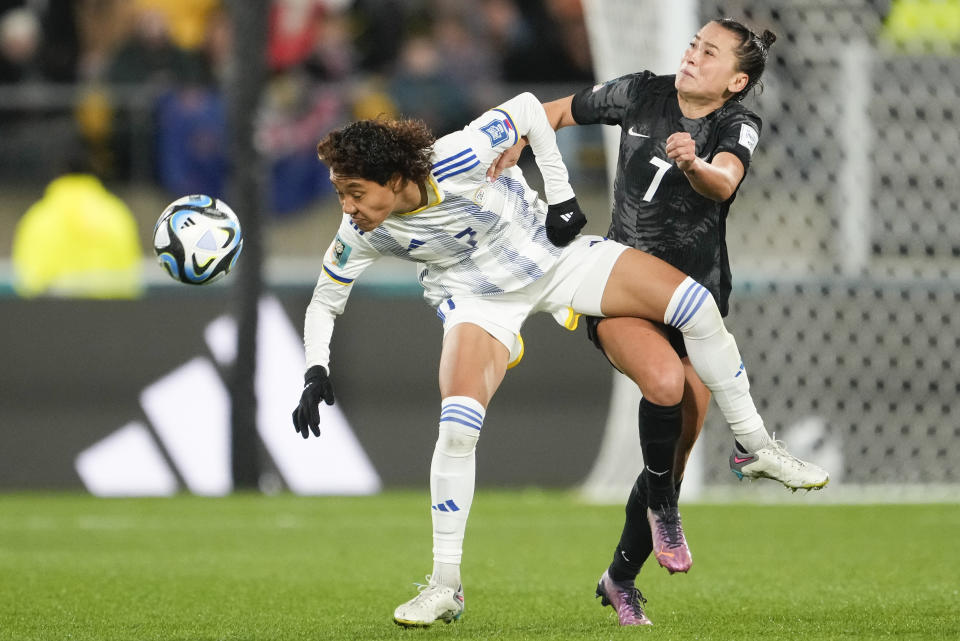 Philippines' Sarina Bolden, left, and New Zealand's Ali Riley compete for the ball during the Women's World Cup Group A soccer match between New Zealand and the Philippines in Wellington, New Zealand, Tuesday, July 25, 2023. (AP Photo/John Cowpland)
