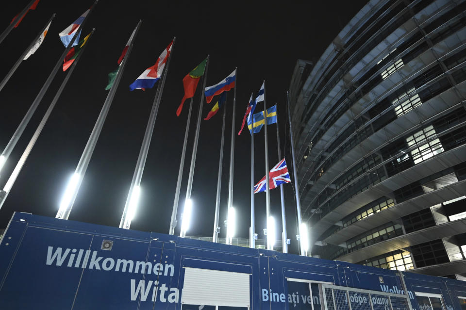 Britain's Union flag is lowered form its pole outside the European Parliament Friday Jan. 31, 2020, in Strasbourg, eastern France. The U.K. is scheduled to leave the EU at 23:00 GMT Friday, the first nation in the bloc to do so. (AP Photo)