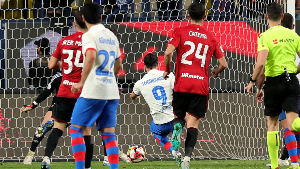 Lewandowski scores his side's first of the game. - Giuseppe Cacace/AFP/Getty Images