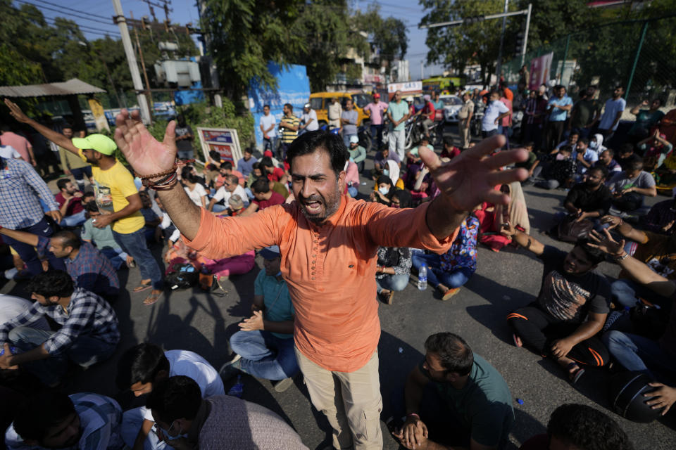 Kashmiri Hindus shout slogans against the killing of Puran Krishan Bhat, shot dead at his home in Shopian, during a protest in Jammu, India, Saturday, India, Oct. 15, 2022. Assailants have fatally shot the Kashmiri Hindu man in violence police blamed on militants fighting against Indian rule in the disputed region. (AP Photo/Channi Anand)