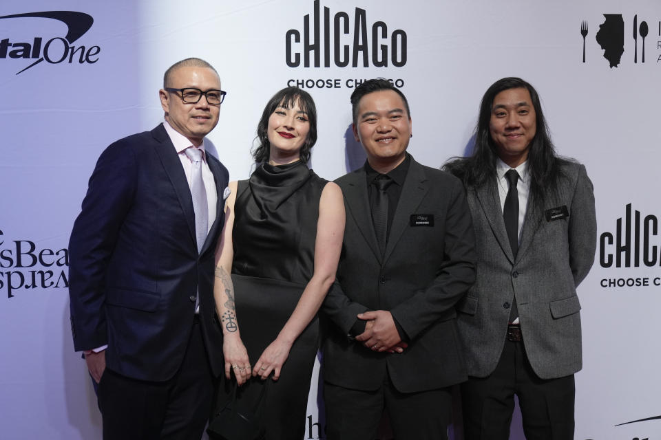 Representatives for Langbaan in Portland, Ore., pose together on the red carpet before the James Beard Awards ceremony Monday, June 10, 2024, in Chicago. Langbaan won the James Beard award for Outstanding Restaurant. (AP Photo/Erin Hooley)