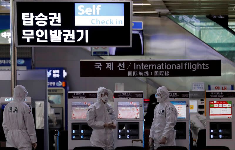 South Korean soldiers carry out disinfection work at the international airport amid the rise in confirmed cases of coronavirus disease (COVID-19) in Daegu