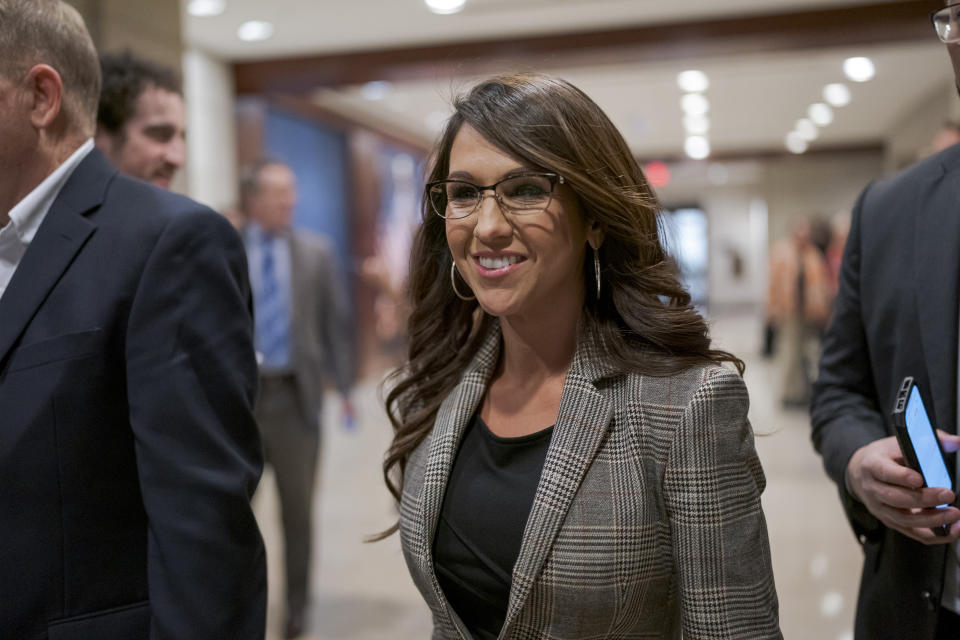 Rep. Lauren Boebert, R-Colo., who is in an unexpected tight race with Democratic challenger Adam Frisch, arrives to meet with fellow Republicans behind closed doors as Republicans hold its leadership candidate forum, where everyone running for a post must make their case to the membership, at the Capitol in Washington, Monday, Nov. 14, 2022. (AP Photo/J. Scott Applewhite)