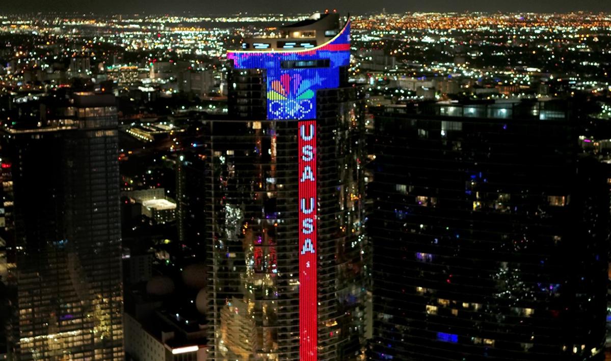 NBC Ignites World’s Tallest Digital Olympic Peacock & Torch Honoring Team USA at Paramount Miami Worldcenter Skyscraper