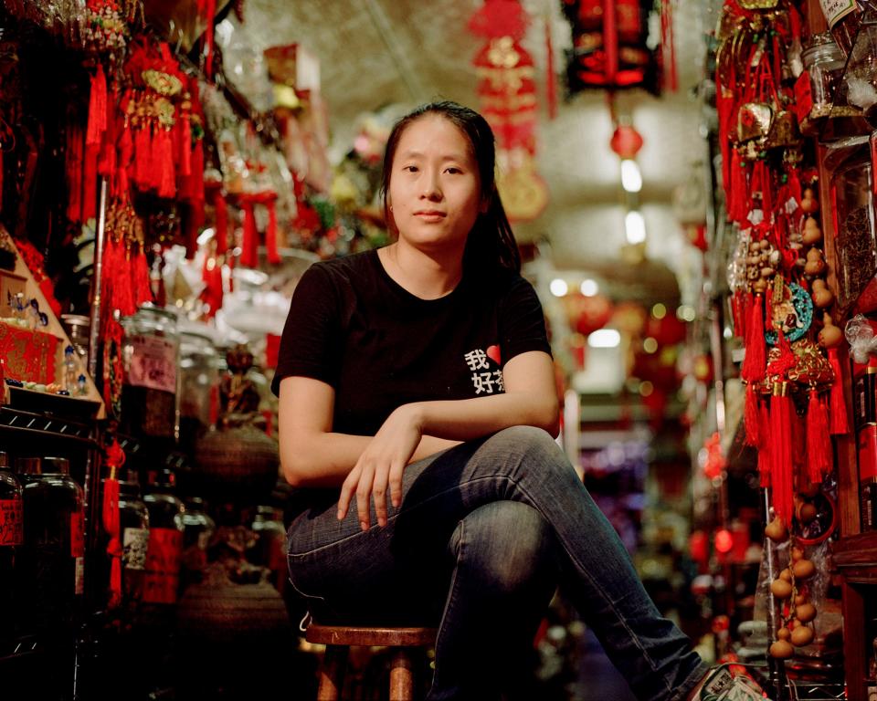 Alice Liu sitting in her store