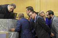 Judge Michael Usan speaks with attorneys just before opening statements in the XXXTentacion murder trial at the Broward County Courthouse in Fort Lauderdale, Fla., Tuesday, Feb. 7, 2023. Emerging rapper XXXTentacion, born Jahseh Onfroy, 20, was killed during a robbery outside of Riva Motorsports in Pompano Beach in 2018. (Amy Beth Bennett/South Florida Sun-Sentinel via AP, Pool)