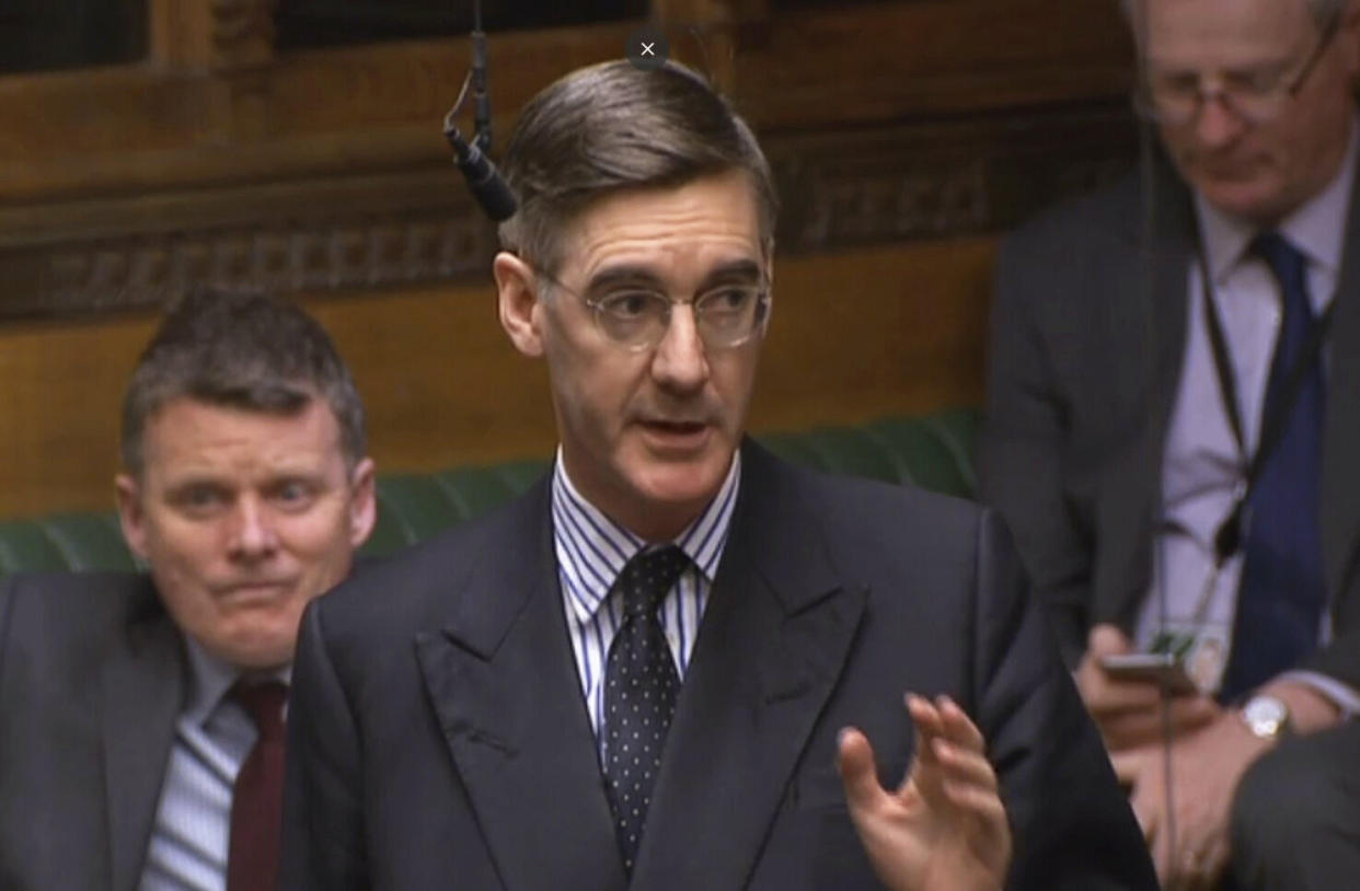 In this grab taken from video, Conservative MP Jacob Rees-Mogg speaks during Prime Minister's Questions in the House of Commons, London, Wednesday March 27, 2019. British lawmakers are preparing to vote Wednesday on alternatives for leaving the European Union as they seek to end an impasse following the overwhelming defeat of the deal negotiated by Prime Minister Theresa May. (House of Commons/PA via AP)