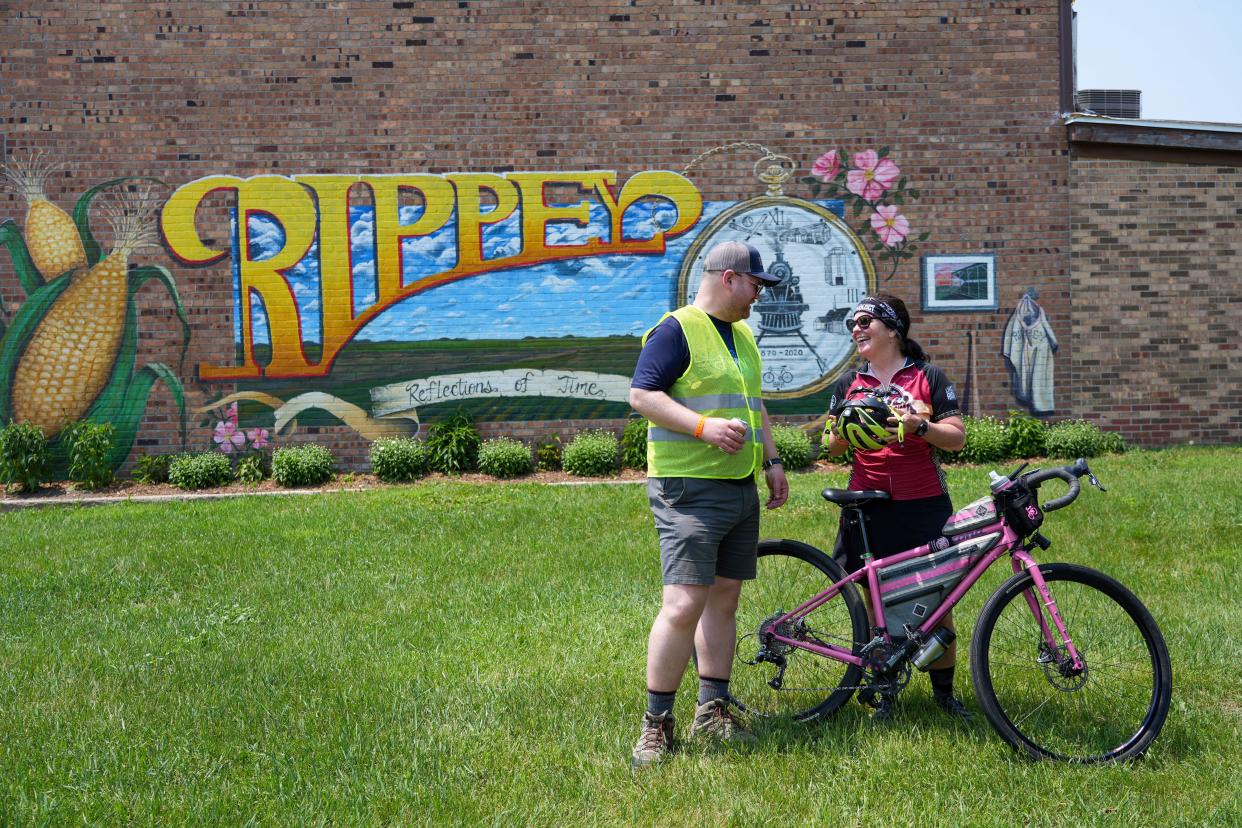 Mike Lindsay and Kathy Murphy chat during a stop in Rippey on the RAGBRAI route inspection ride, Tuesday, June 6, 2023. 