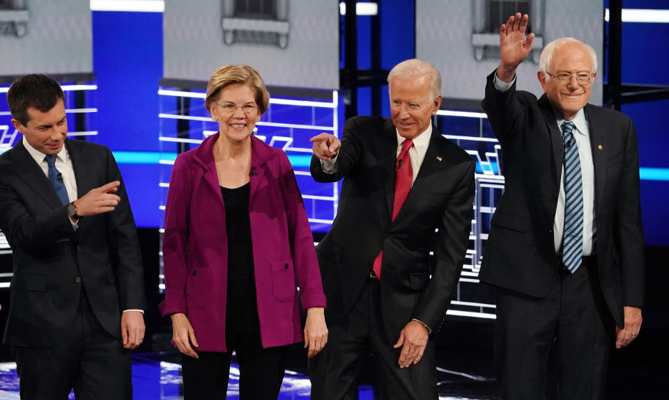 South Bend Mayor Pete Buttigieg, Senator Elizabeth Warren, former Vice President Joe Biden and Senator Bernie Sanders arrive onstage during the U.S. Democratic presidential candidates debate at the Tyler Perry Studios in Atlanta, Georgia, U.S. November 20, 2019. REUTERS/Brendan McDermid