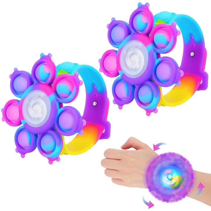 pop it on spinning on toddler's wrist