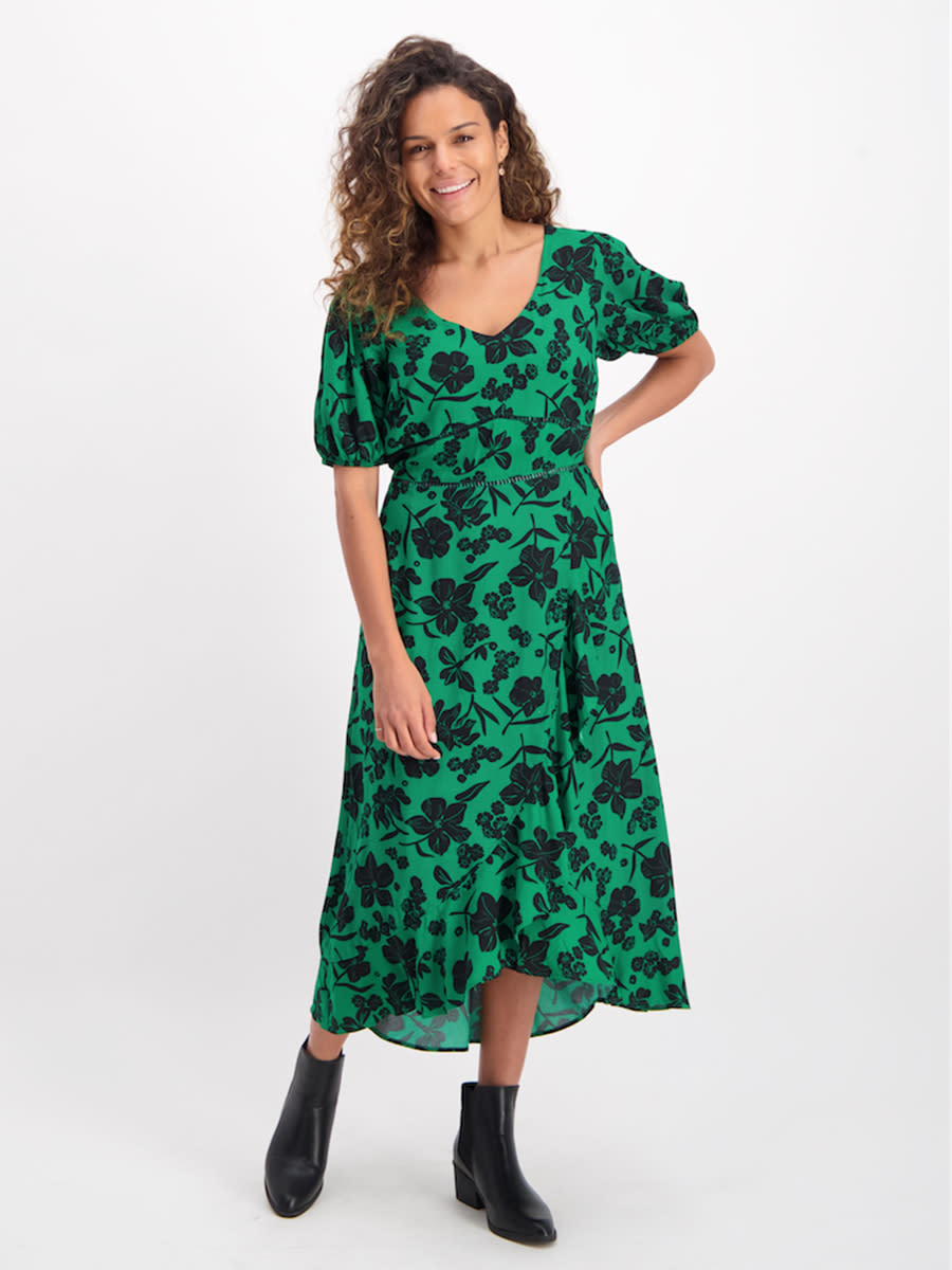 Grownups can get in on the fun with this $25 green ruffled wrap dress. Photo: Best&Less (supplied.)