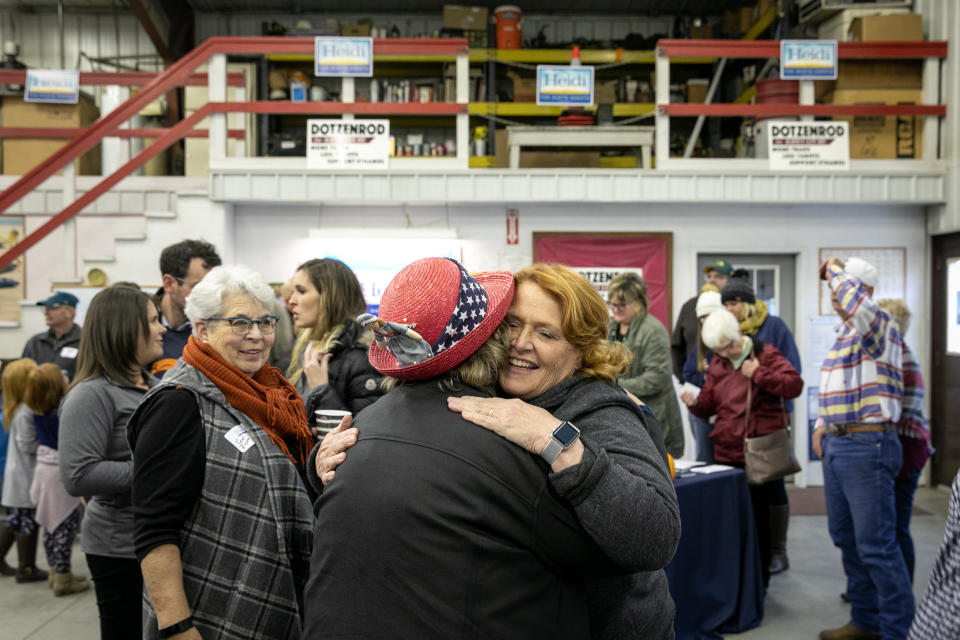 Heitkamp hugs a backer at the rally in Wyndmere. (Photo: Ilana Panich-Linsman for HuffPost)