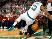 May 23, 2018; Boston, MA, USA; Boston Celtics forward Marcus Morris (13) falls on top of Cleveland Cavaliers forward LeBron James (23) after reaching for the ball during the first quarter of game five of the Eastern conference finals of the 2018 NBA Playoffs at TD Garden. Mandatory Credit: Greg M. Cooper-USA TODAY Sports