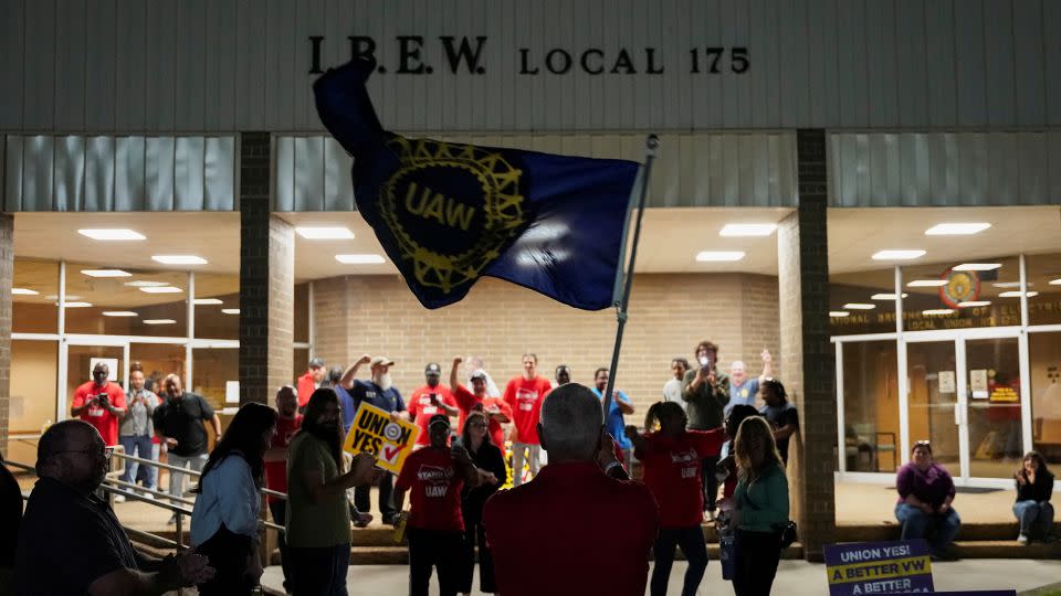 People celebrate as the result of a vote comes in favor of the hourly factory workers at Volkswagen's assembly plant to join the United Auto Workers (UAW) union, at a watch party in Chattanooga, Tennessee, on April 19. - Seth Herald/Reuters