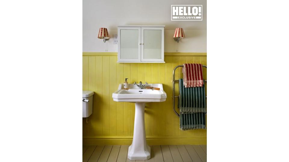 Penelope Chilvers' yellow bathroom at Cotswolds home