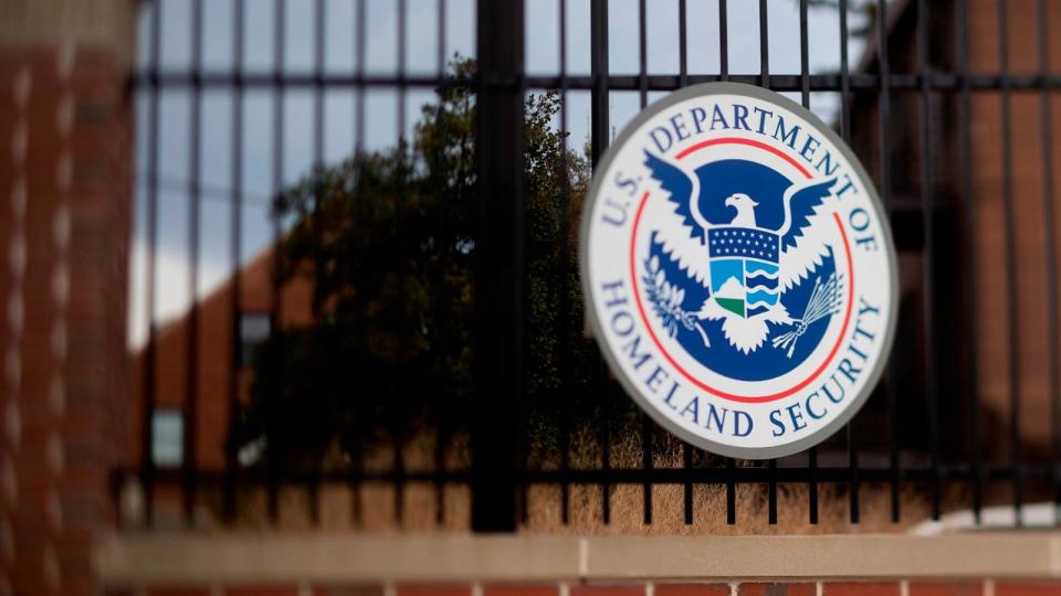 PHOTO: In this Dec. 11, 2014 file photo, the U.S. Department of Homeland Security (DHS) seal hangs on a fence at the agency's headquarters in Washington. (Andrew Harrer/Bloomberg via Getty Images, FILE)