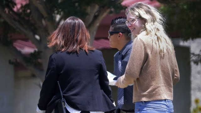 Elizabeth Holmes is shown.