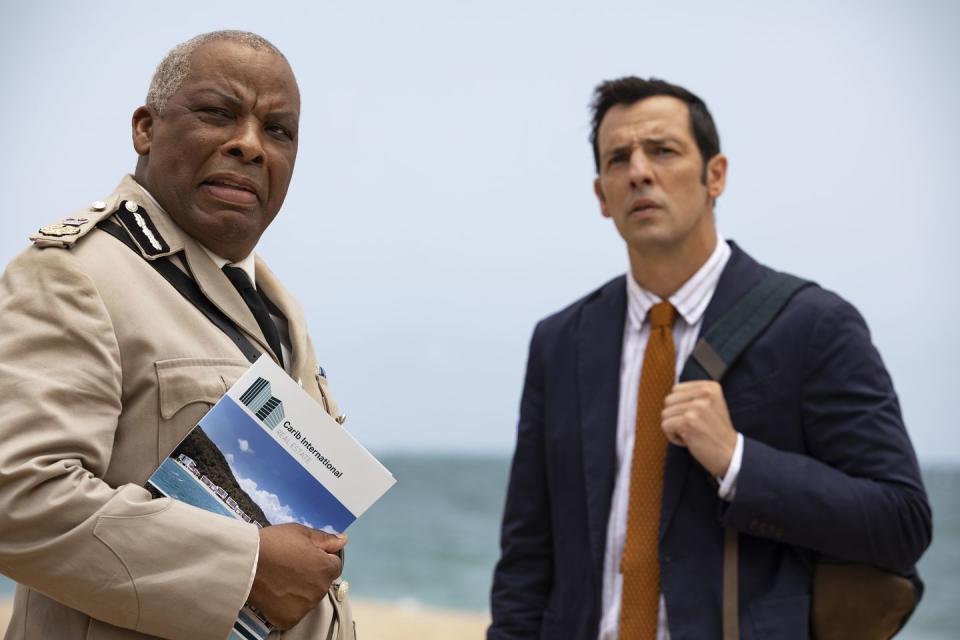 don warrington and ralf little as selwyn patterson and neville parker in death in paradise