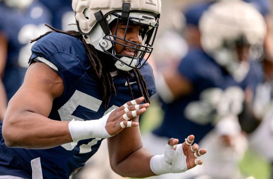 Penn State defensive end Hakeem Beamon runs a drill during practice on Tuesday, April 11, 2023.