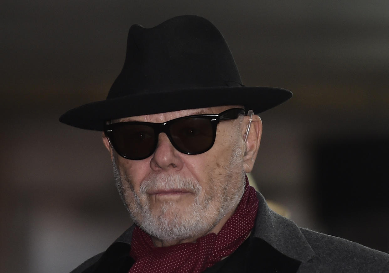 British former pop star Gary Glitter, whose real name is Paul Gadd, leaves Southwark Crown Court in London February 4, 2015. The jury has retired to consider its verdict in Glitter's trial on charges of sexual offences involving underage girls. REUTERS/Toby Melville (BRITAIN - Tags: CRIME LAW ENTERTAINMENT)