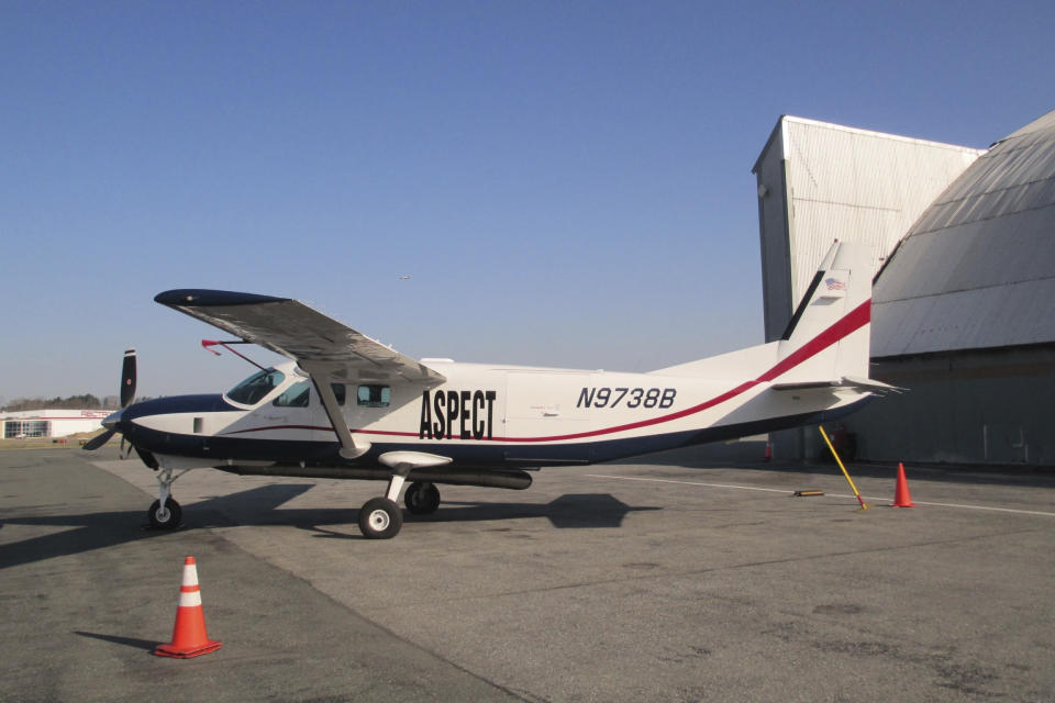 In this undated photo provided by Robert Kroutil shows the modified Cessna cargo plane that the EPA uses to help evaluate chemical disasters and fires, in Boston. A whistleblower has questioned why the plane wasn't deployed for days after the 2023 fiery Ohio derailment and gathered incomplete information. (Robert Kroutil via AP)