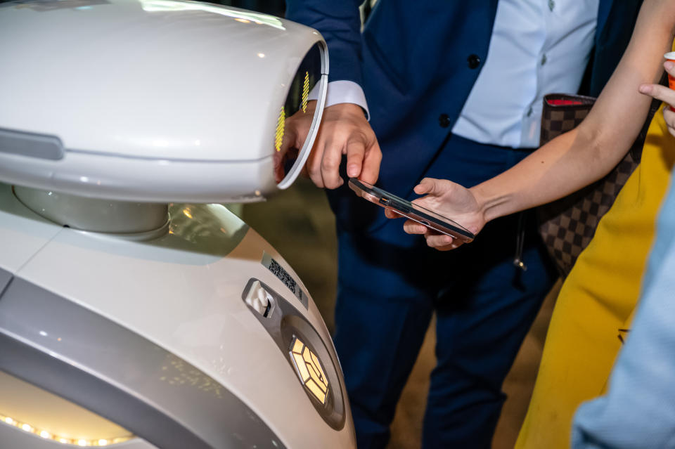 Members of the public are able to interact with the robot by scanning its QR code. (PHOTO: LionsBot)