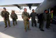 U.S. and Afghan air crew prepare for a flight at the Kabul military airport in Kabul, Afghanistan July 9, 2017. REUTERS/Omar Sobhani