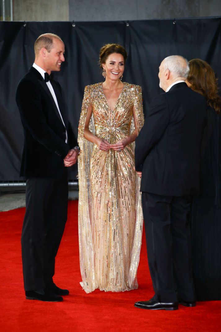 Britain’s Prince William, left, and his wife Kate the Duchess of Cambridge are greeted by Barbara Broccoli and Michael G. Wilson upon arrival for the World premiere of the new film from the James Bond franchise, ‘No Time To Die’, in London Tuesday, Sept. 28, 2021. - Credit: AP