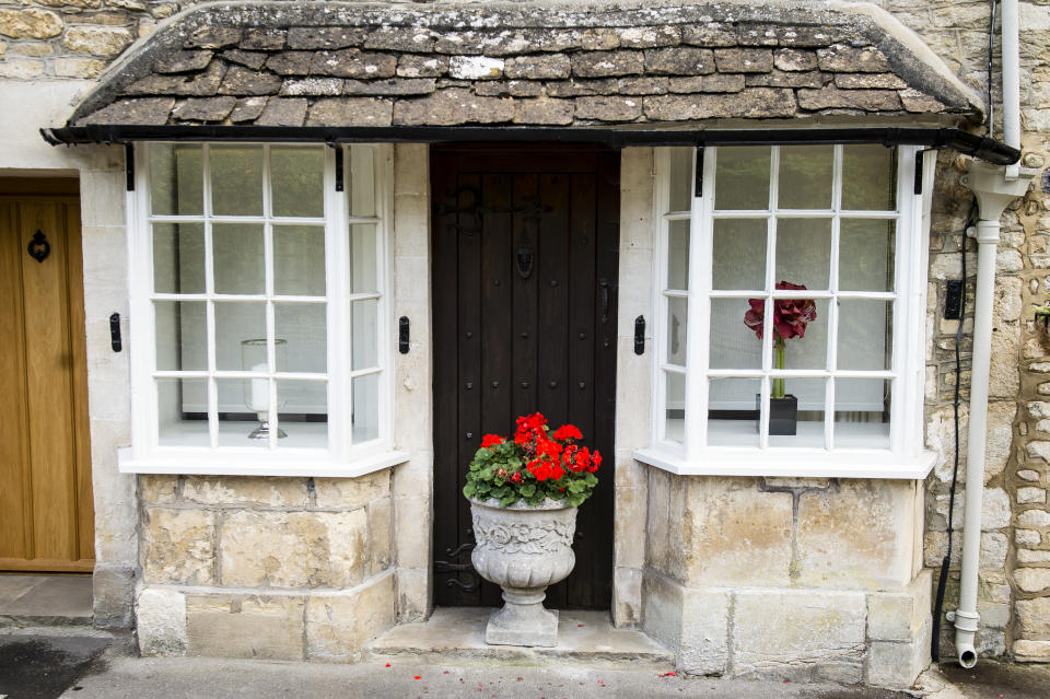 The front windows of a cottage in the village of Castle Combe, Wiltshire. PRESS ASSOCIATION Photo. Picture date: Thursday September, 24, 2015. Photo credit should read: Ben Birchall/PA Wire