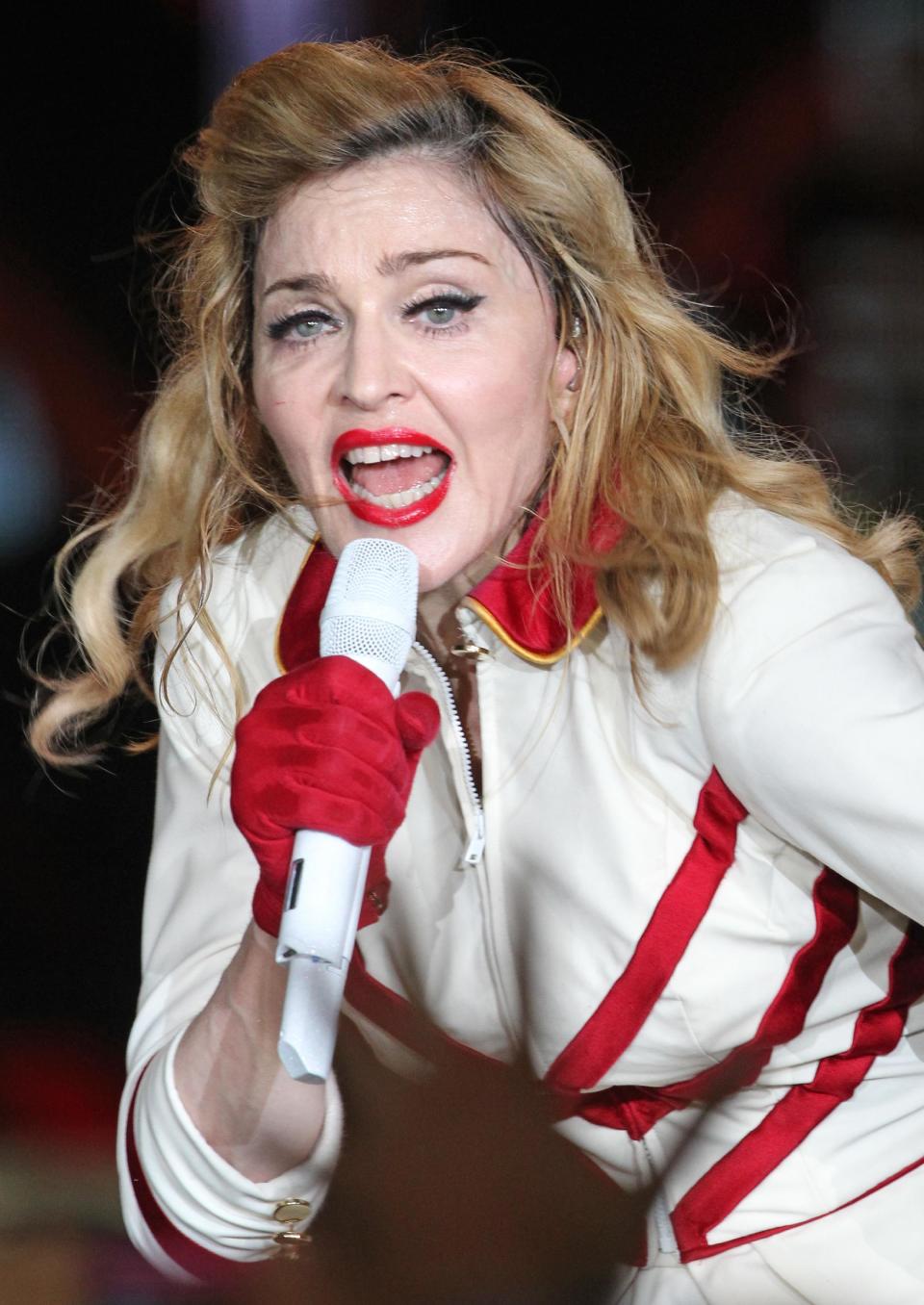 U.S. singer Madonna performs during her concert at Olympic Hall in Moscow, Russia, Tuesday, Aug. 7, 2012. Madonna has voiced hope that three feminist Russian rockers on trial for performing a "punk prayer" against Vladimir Putin are released soon. The pop star told the AP during her concert tour of Russia that she supports freedom of speech and hopes the judge will show leniency. (AP Photo/Mikhail Metzel)