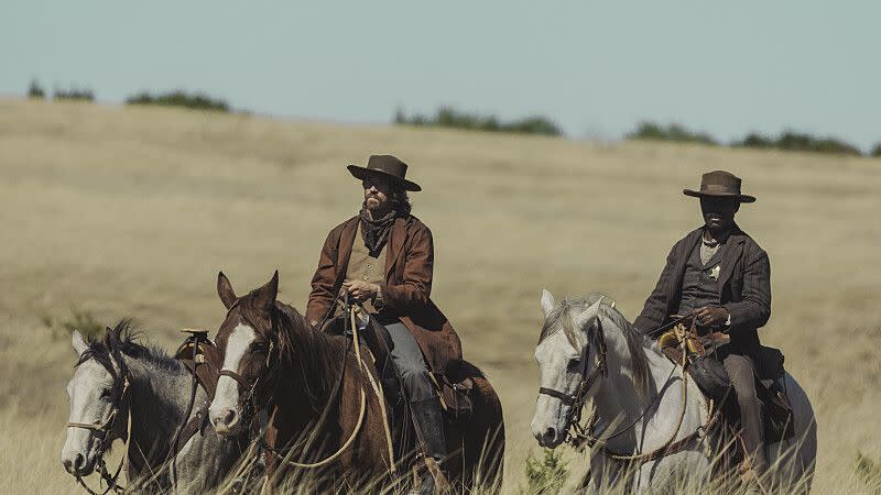 garrett hedlund as garrett montgomery and david oyelowo as bass reeves in lawmen bass reeves, episode 3, season 1, streaming on paramount, 2023 photo credit emerson millerparamount