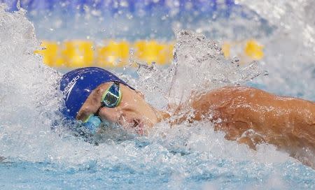 Britain's James Guy swims to win gold in the men's 200m freestyle final at the Aquatics World Championships in Kazan, Russia, August 4, 2015. REUTERS/Stefan Wermuth