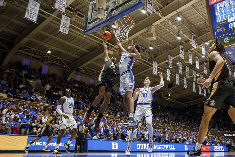 Duke's Dereck Lively II (1) blocks the shot of Florida State's Matthew Cleveland (35) during the first half of an NCAA college basketball game in Durham, N.C., Saturday, Dec. 31, 2022. (AP Photo/Ben McKeown)