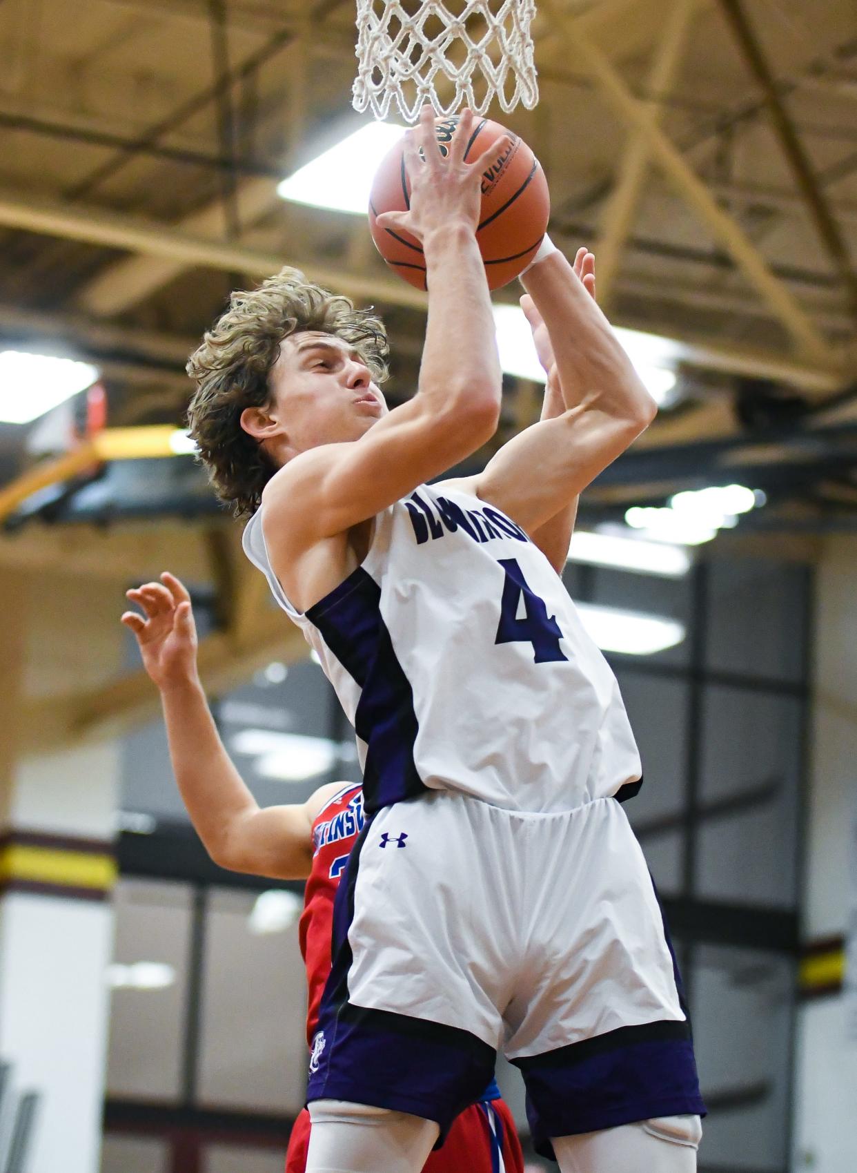 Bloomington South’s Alex Shaevitz (4) rebounds the ball during the IHSAA boys’ basketball sectional semifinal game against Martinsville at Bloomington North on Friday, March 1, 2024.