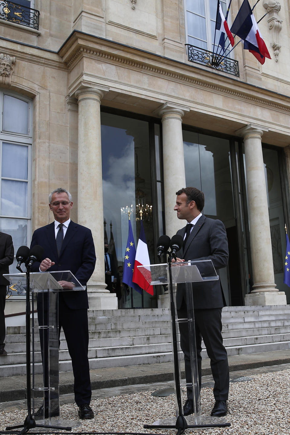 French President Emmanuel Macron, right, and NATO Secretary General Jens Stoltenberg deliver a statement to reporters Friday, May 21, 2021 after heir talks at the Elysee palace in Paris. (AP Photo/Francois Mori)