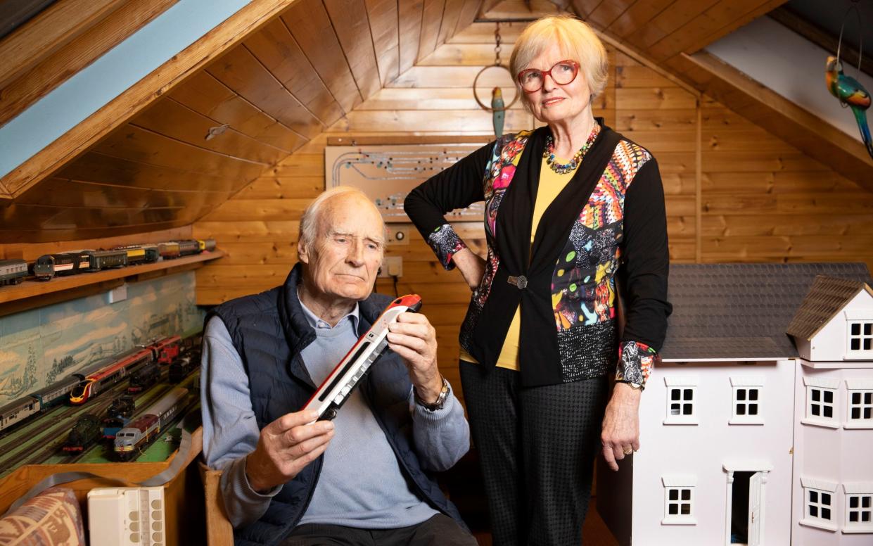 Peter and Ann Snow at home with his train set - Jeff Gilbert for The Telegraph