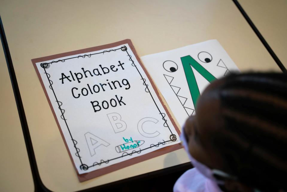 Children participate in a learning activity at Angels of Essence Child Care Centre, a 24-hour child care facility, in Detroit on Thursday, July 14, 2022. 