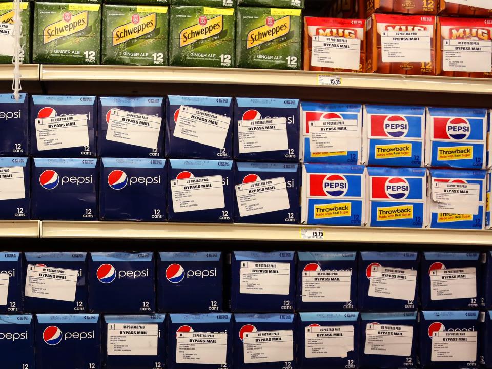 Pepsi and other sodas with bypass mail stickers in Hooper Bay, Alaska.