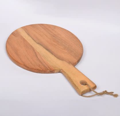 Serve up meats and cheeses on this aesthetic acacia wood cutting board