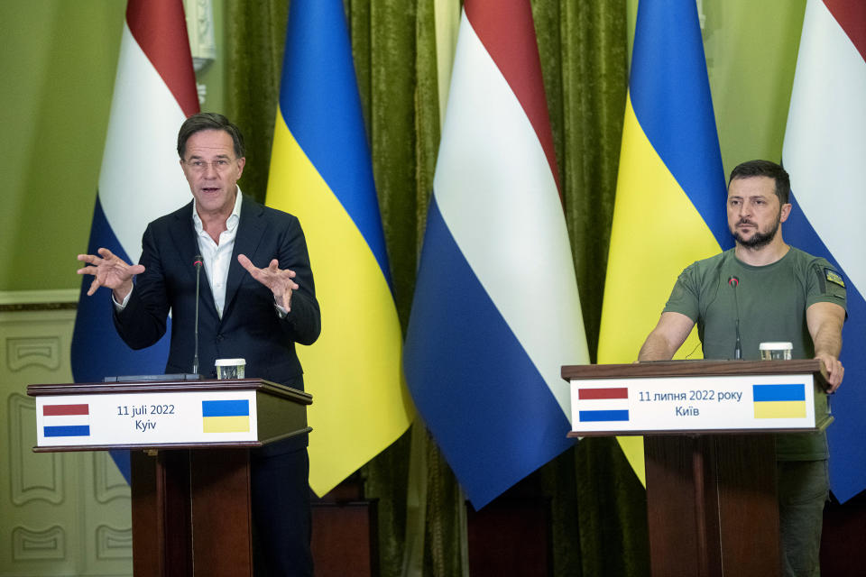 President of Ukraine Volodymyr Zelenskyy, right, and Prime Minister of the Netherlands Mark Rutte attend a joint press conference in Kyiv, Ukraine, Monday, July 11, 2022. (AP Photo/Andrew Kravchenko)