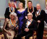 U.S. Secretary of State Hillary Clinton (C,standing) joins the five 2009 Kennedy Center Honorees opera singer Grace Bumbry (seated,L), jazz pianist Dave Brubeck (seated,R), actor Robert de Niro (L), rock star Bruce Springsteen (2nd,R) and comedian, director, composer and producer Mel Brooks as they pose for a group photo at the conclusion of the gala dinner at the U.S. State Department in Washington, December 5, 2009. REUTERS/Mike Theiler