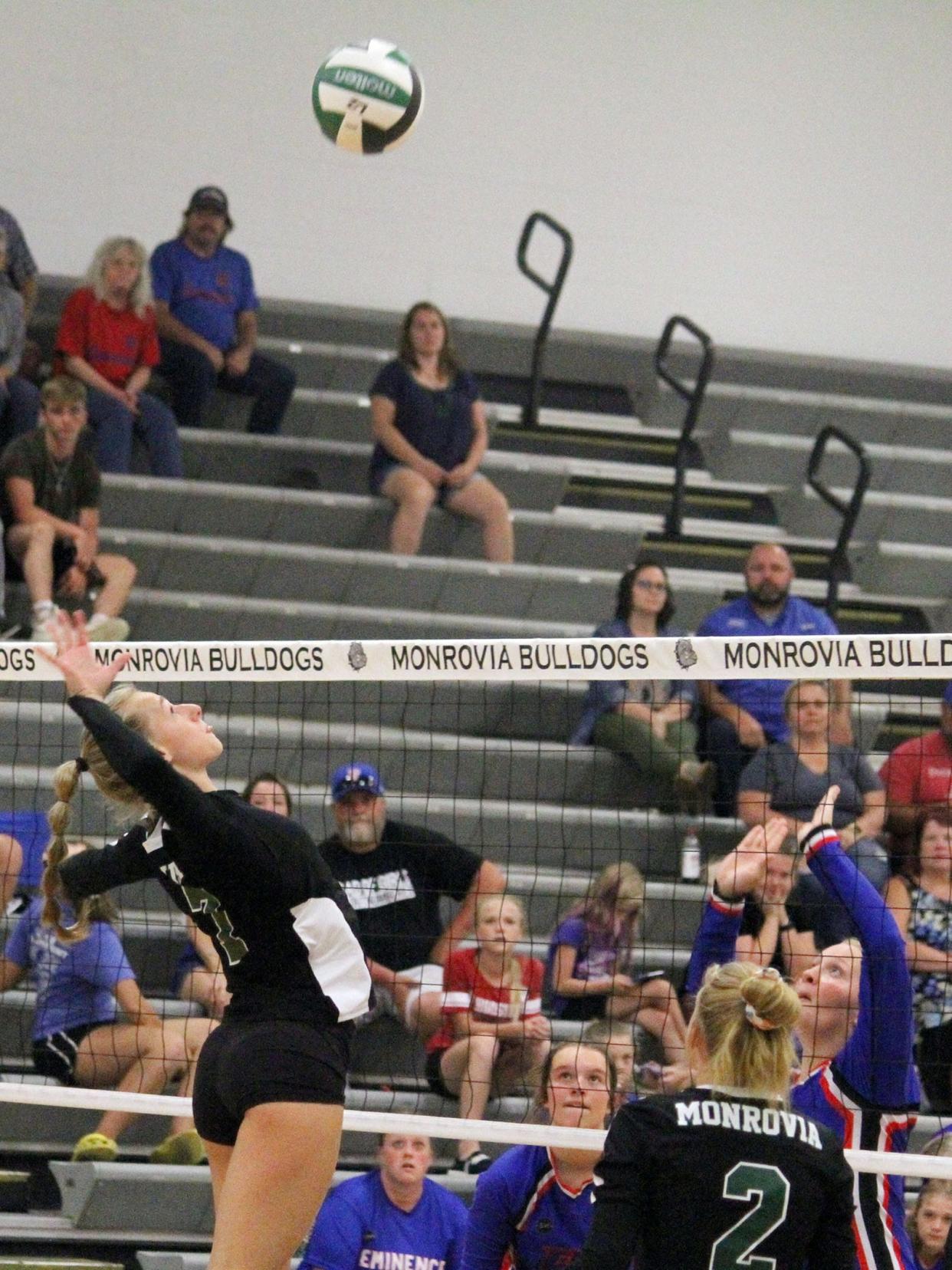 Monrovia sophomore Raegan Stader goes in for the kill during Tuesday's game against Eminence.