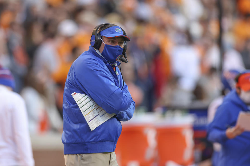 Florida head coach Dan Mullen looks on during the first half of an NCAA college football game against Tennessee in Knoxville, Tenn., Saturday, Dec. 5, 2020. (Randy Sartin/Knoxville News Sentinel via AP, Pool)